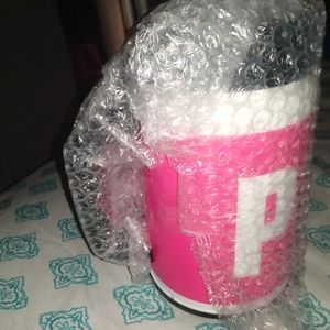 Women pink Victoria secret coffee cup